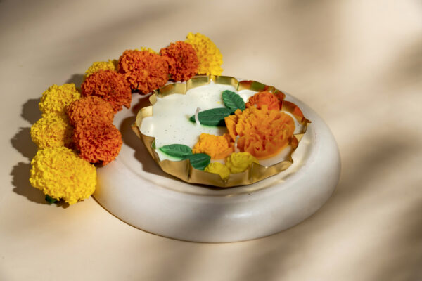 Festival Bloom – Hand-Poured Lotus Urli Candle with Marigold Detailing