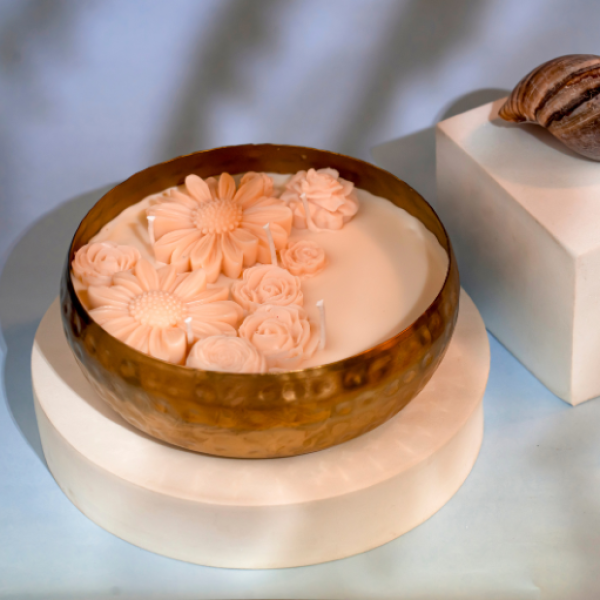 Sunset Radiance – Hand-Poured Brass Urli Candle with Peach Floral Detailing