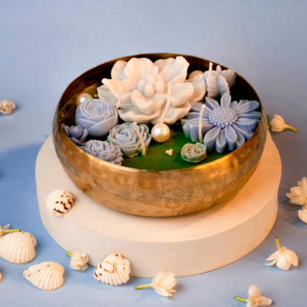 Serene Horizon – Hand-Poured Brass Urli Candle with Pastel Floral Wax Design