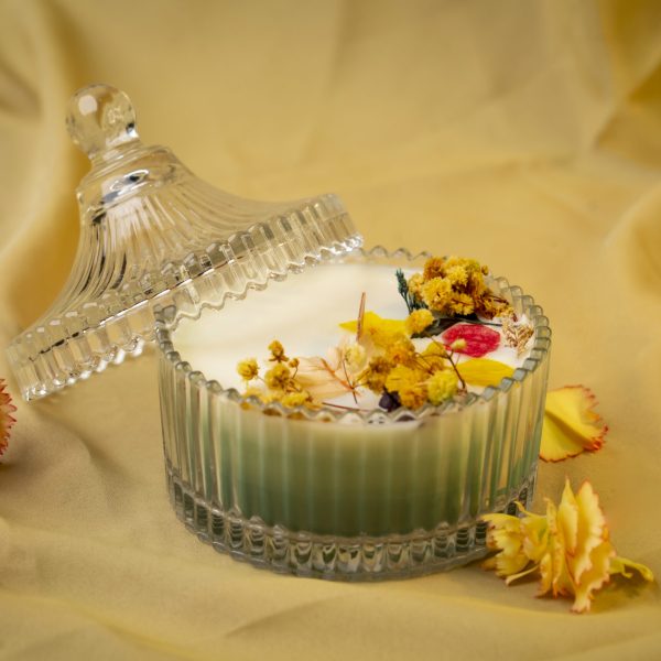 Emerald Bloom — a hand-poured green glass jar candle with dried botanicals, crafted to bring freshness, calm, and elegance into your space.
